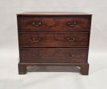 Georgian mahogany chest of three drawers, each with brass bale handles and on bracket feet, 97cm