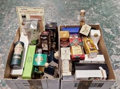 Two boxes of spirit and liqueur gift sets in miniature and smaller sizes, with individual tubed