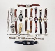 Collection of Mickey Mouse related wristwatches of varying shapes and designs, including examples on