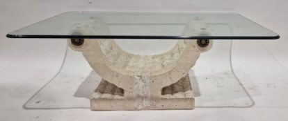 Modern glass topped coffee table supported by a carved stone-effect U-shaped pedestal support, the