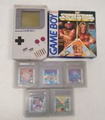 Nintendo Game Boy and six game cartridges to include Super Mario Land, Double Dragon, Blades of