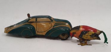 1930's German JNF tinplate streamlined car with green and tan body marked J N 28 to rear together