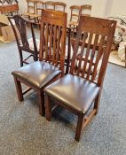Pair of stained hardwood modern high back dining chairs with leather upholstered pad seat