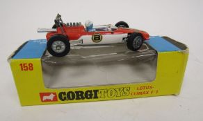 Three boxed diecast models to include Dinky Toys 370 Dragster set, Corgi 158 Lotus-CLimax F/1 and