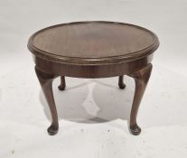 Waring & Gillow circular mahogany coffee table raised on four cabriole supports, with pad feet, 41cm