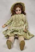 Large Armand Marseille (German) bisque head doll, early 20th century, impressed 1894/AM 7 DEP,