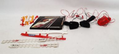 Large quantity of Scalextric track and accessories to include a boxed Scalextric lap counter, fence,