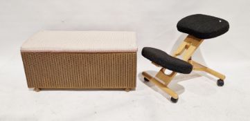 Lloyd Loom ottoman with padded cover and a modern beech-framed kneeling chair on four castors (2)