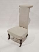 Victorian prie dieu chair with plain linen upholstery, on turned front supports and with brass