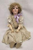 Large Heubach Koppelsdorf bisque head doll, early 20th century, impressed Heubach/302.12 Koppelsdorf