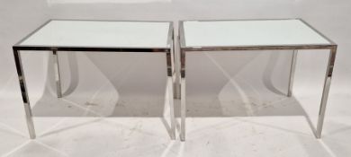 Two modern chromed metal tables with white glass tops, height 62cm, length 86cm, Width 58cm and a