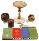 Two vintage treen wooden fishing reels, a turned mahogany adjustable candle stand, a collection of