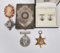 Pair of modern gent's Mont Blanc cufflinks of knot form, in original box, a white metal cigarette