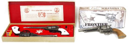 BCM Co Derby 'Apache Calibre .44' pair of Remington Cap Guns in box with spare caps and a Edison