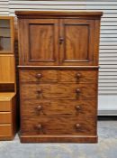 Victorian Heal & Son cabinet chest with cupboard above, three long and two short drawers, each