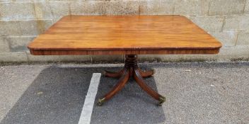 Late Regency rectangular mahogany tilt-top breakfast table raised on pedestal with turned column and