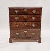 19th century mahogany chest of four drawers, each having pierced brass plates and drop handles, on