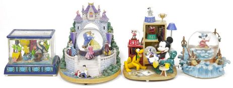 Four Disney musical snow globes to include Fantasia snow globe playing 'The Sorcerer's