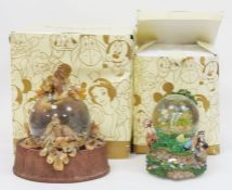 Two Disney Store Exclusives Deluxe Bambi snow globes both playing 'Little April shower'  both in