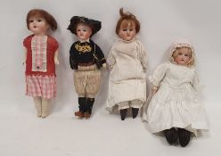 Four early 20th century bisque head dolls, comprising: a Parisian boy doll stamped SFBJ/60/Paris,