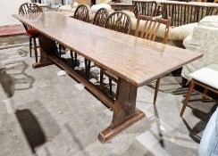 Modern oak refectory-style dining table on trestle supports with straight stretcher, 244cm long x