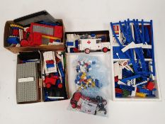 One box of loose Lego pieces together with various instructions