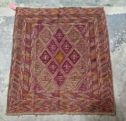 Mashwani green ground Gazak, with central lozenge shaped trelliswork, multiple geometric borders