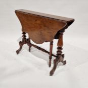 Edwardian quatrefoil-shaped mahogany tray with ogee moulded rim and two brass carrying handles,