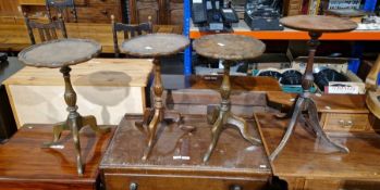 Four various wine tables on tripod supports (4)