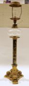 Large Victorian gilt metal mounted converted library oil lamp, with foliate carved globular