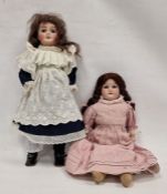 Two early 20th century dolls, the first a Lanternier et Cie Limoges 'Cherie 4' bisque head doll,
