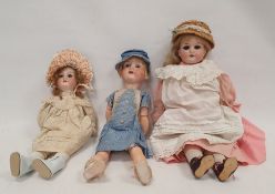 Three early 20th century Armand Marseille (German) bisque-headed and shoulderhead dolls, the