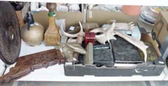 Carved Indian hardwood occasional table, a pair of antlers, a tinplate model of a VW Campervan,