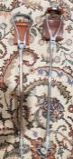 Two chrome and leather shooting sticks (2)