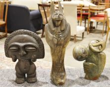 Hardstone model of Anubis, an African Shona stone, an abstract sculpture of two figures and a