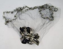 1920's/30's head piece with silver and black sequinned bows, with net sequin veil