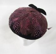 Various vintage feathered hats to include a Hylda Morris black hat with pheasant feathers dyed pink,