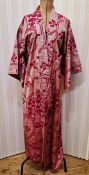 A modern silk screen printed Japanese kimono, possibly in a state of being made, as running stitch