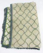 Woolwork tapestry rug cream and green, red tasselled sash, Eastern lightly coloured belt, a small