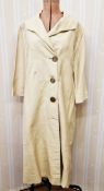 1940's raw silk cream duster/driving coat with three button fastening, three-quarter length sleeves,