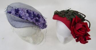 Various vintage hats to include a pink straw hat embellished with faux silk roses and leaves,