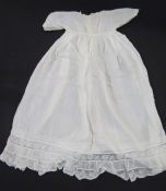 Assorted silk and cotton babygowns, lace trimmed, crocheted, woollen blankets, sheets, crocheted