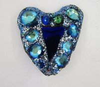 Andrew Logan heart brooch set blue stones, a blue triangular centre, signed and dated 2010 to