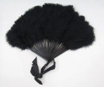 Ostrich feather fan with black painted wooden sticks (three are repaired), a Chinese/Japanese