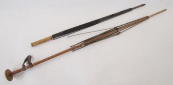 Two vintage umbrella frames and a vintage umbrella with a brass-coloured metal goose head finial (3)