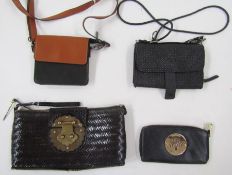 Vintage Mulberry wallet in black leather with the brass Mulberry logo to the front, a vintage