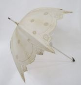 Five various vintage parasols, one with a folding wooden handle, turquoise silk lining and