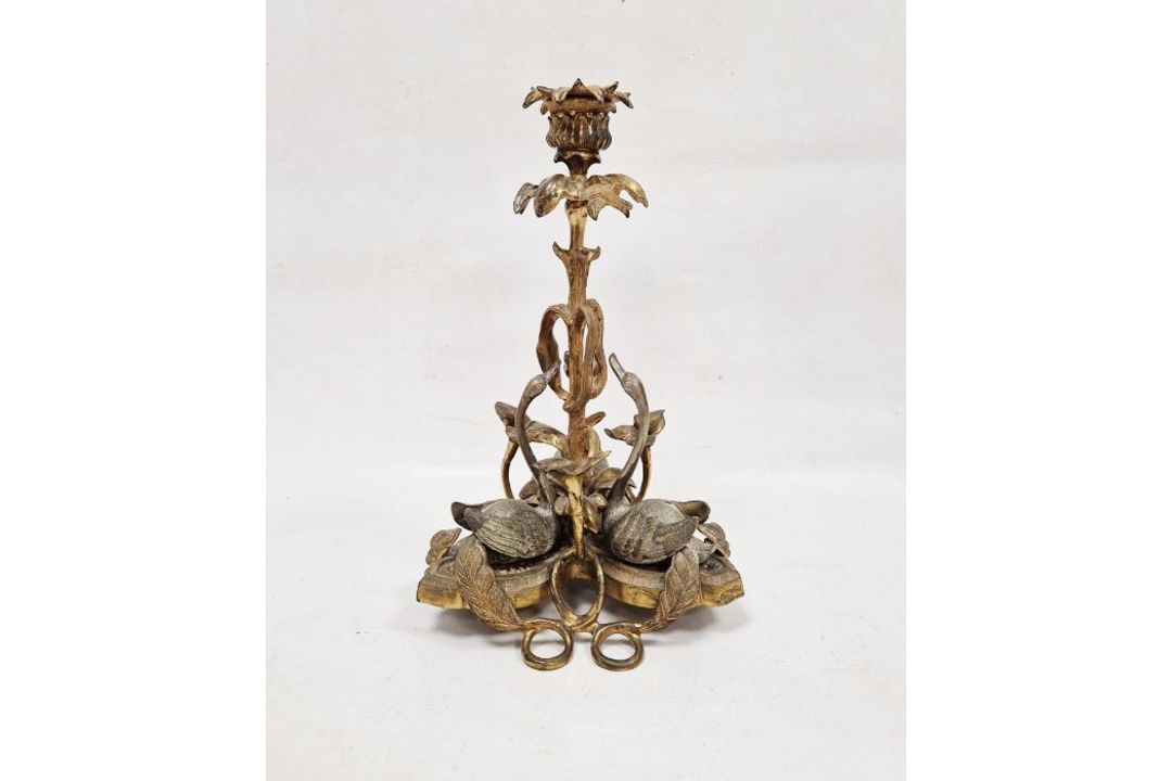 Late 19th century gilt metal candlestick surmounted with three swans before a frond sconce nozzle - Image 1 of 2