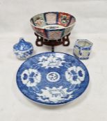 Japanese Imari fluted circular bowl, 19th century, painted with phoenix and crane within diaper-