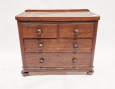 Victorian mahogany veneered chest of drawers, having two short over two long drawers, each with